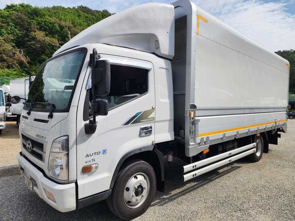 현대 더뉴마이티 3.5톤 윙바디 2025년식 도어 AUTO ZF·EX5 배지